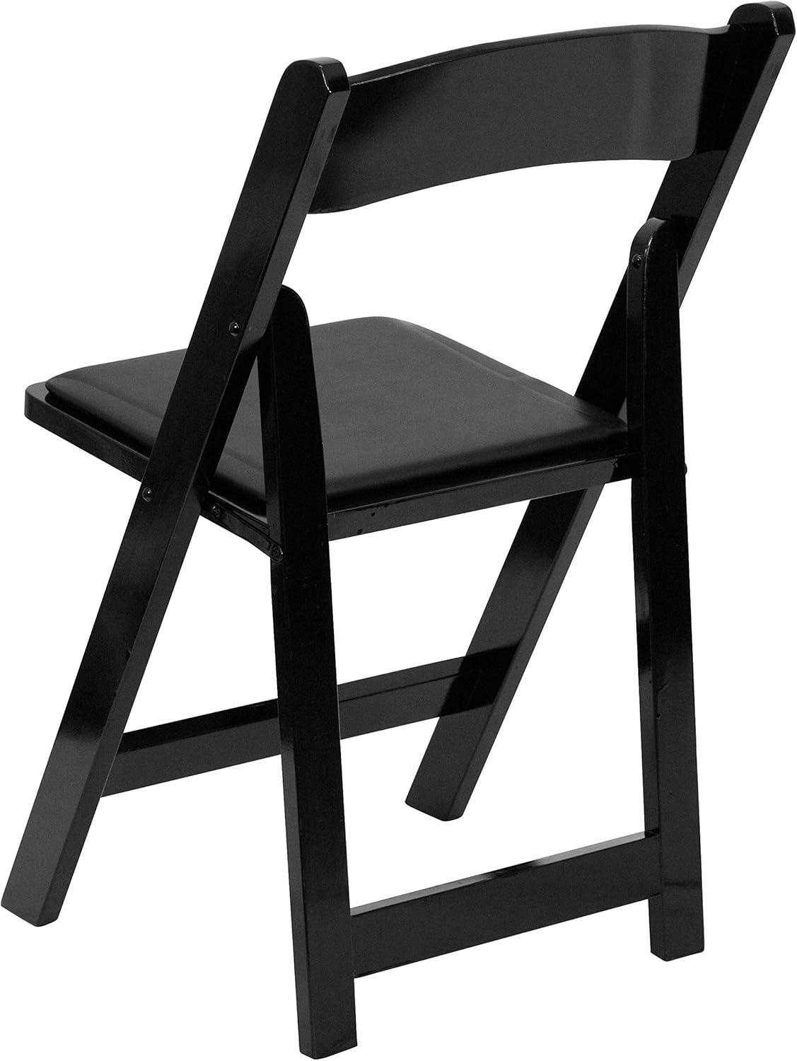 imageFlash Furniture 4 Pack HERCULES Series Fruitwood Wood Folding Chair with Vinyl Padded SeatBlack