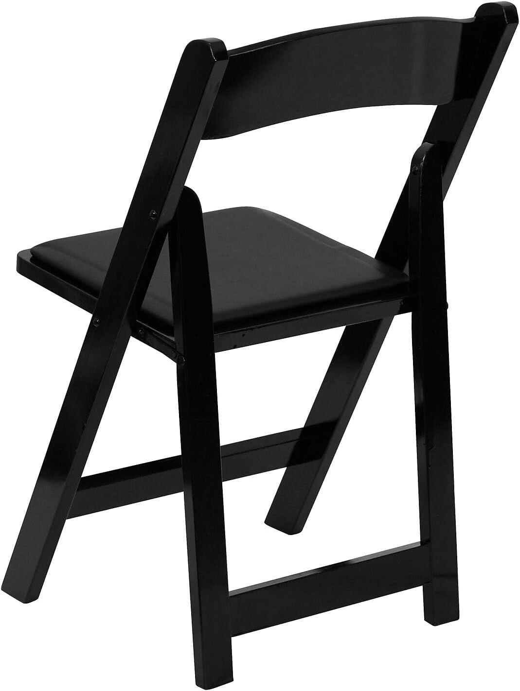 imageFlash Furniture 4 Pack HERCULES Series Fruitwood Wood Folding Chair with Vinyl Padded SeatBlack