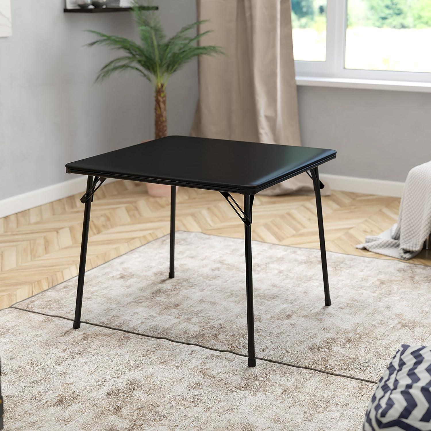 imageFlash Furniture 4 Pack Hercules Series Black Vinyl Metal Folding Chair with Carrying Handle and Madelyn Folding Card Table Black Portable Square Table with Collapsible Legs