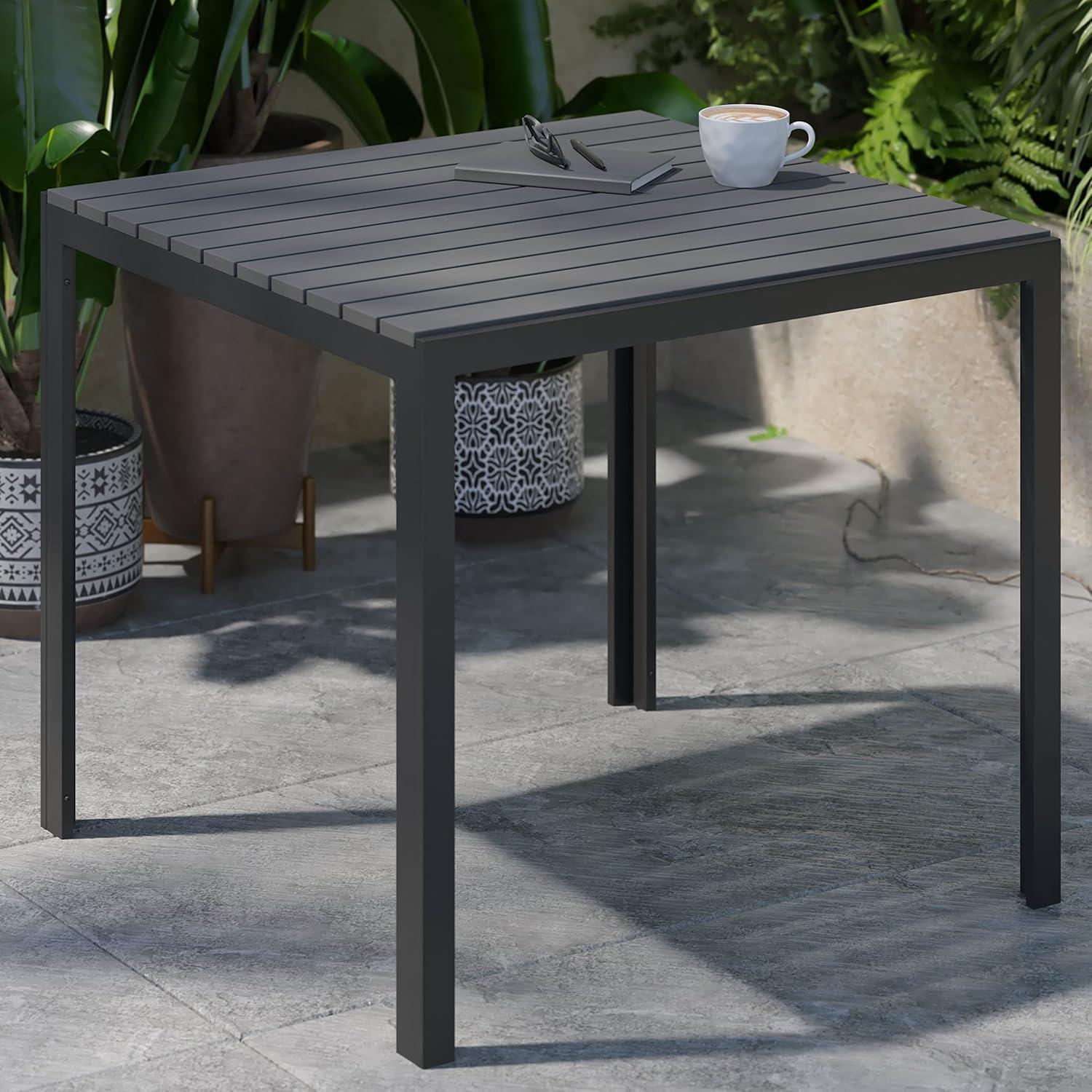 imageFlash Furniture Harris Commercial IndoorOutdoor Patio Table Black Poly Resin Slatted Top Black Steel Frame Seating for 4
