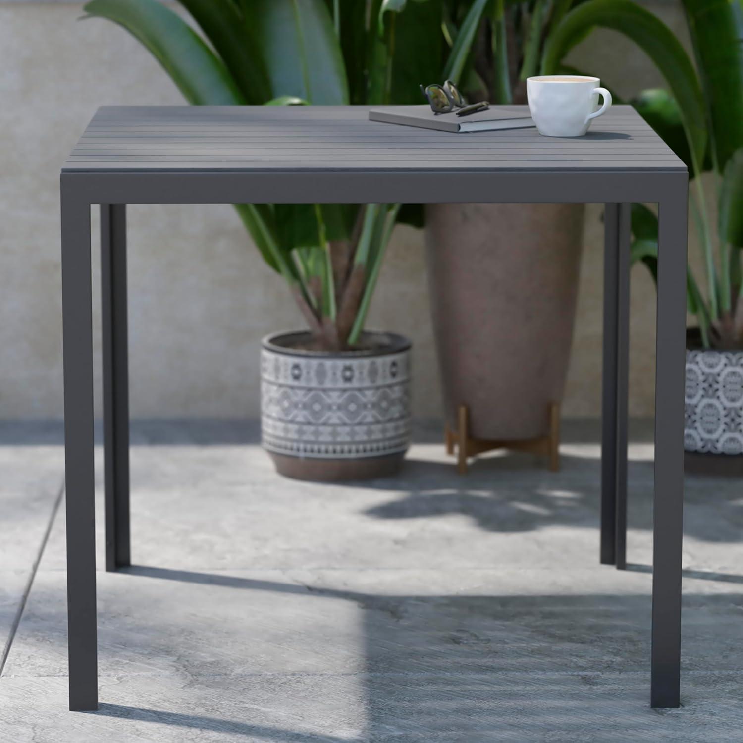 imageFlash Furniture Harris Commercial IndoorOutdoor Patio Table Black Poly Resin Slatted Top Black Steel Frame Seating for 4
