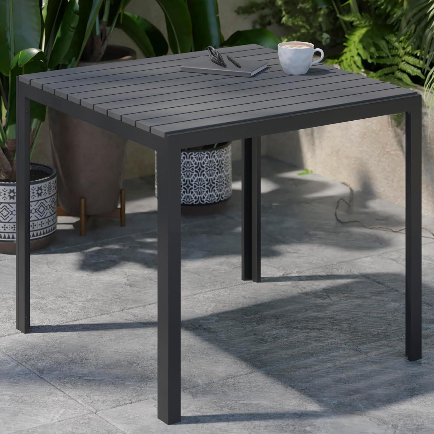 imageFlash Furniture Harris Commercial IndoorOutdoor Patio Table Black Poly Resin Slatted Top Black Steel Frame Seating for 4