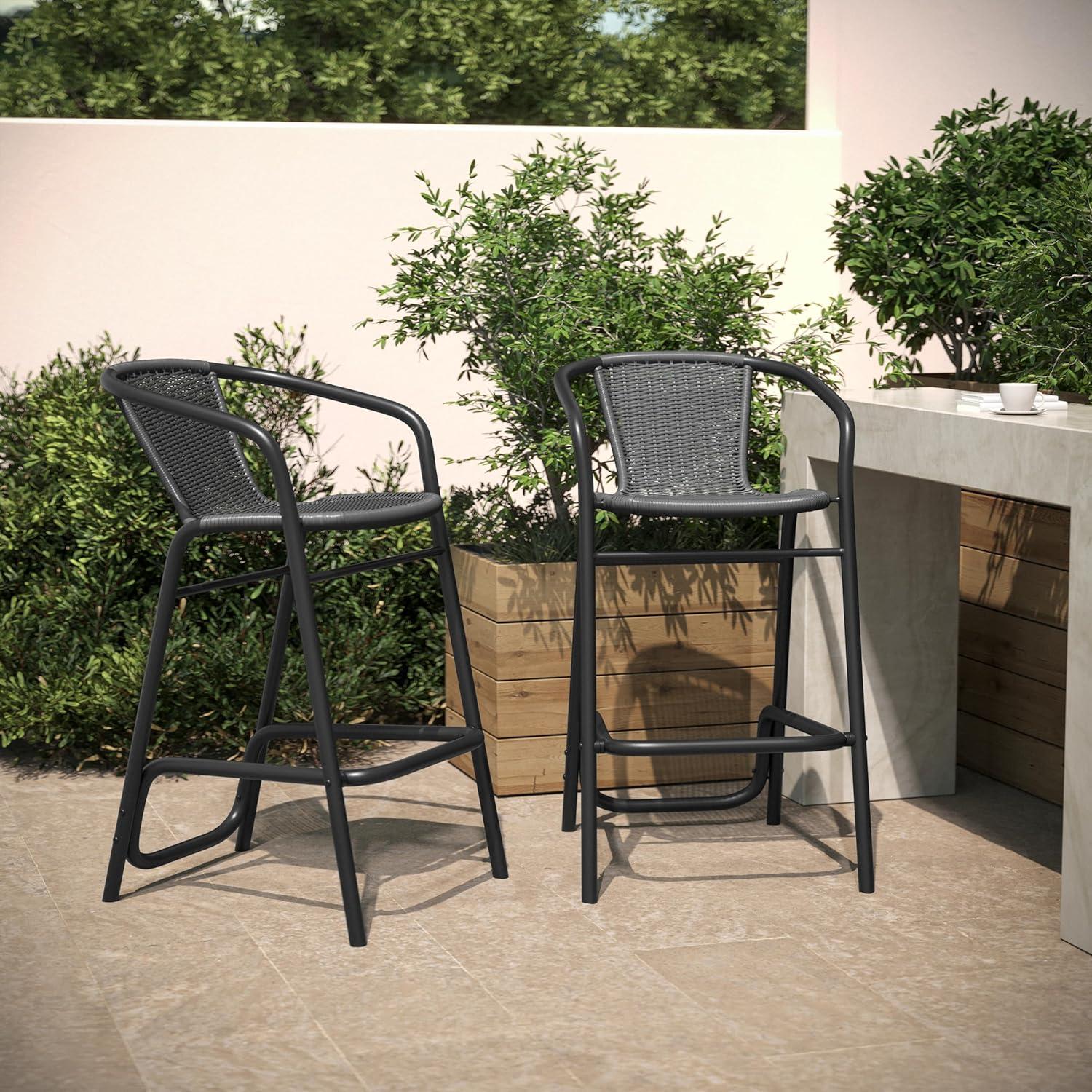 imageFlash Furniture Lila Commercial Grade Rattan IndoorOutdoor Commercial Restaurant Barstool Rattan Seat and Back Footrest Medium Brown 4 PackGrey