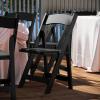 Flash Furniture 4 Pack HERCULES Series Fruitwood Wood Folding Chair with Vinyl Padded Seat(Black)