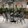 Flash Furniture Brazos Commercial Outdoor Dining Set, 60″ Tempered Glass Patio Table with Umbrella Hole, 6 Stack Chairs with Flex Comfort Seats and Backs, Gray/Black(Grey)