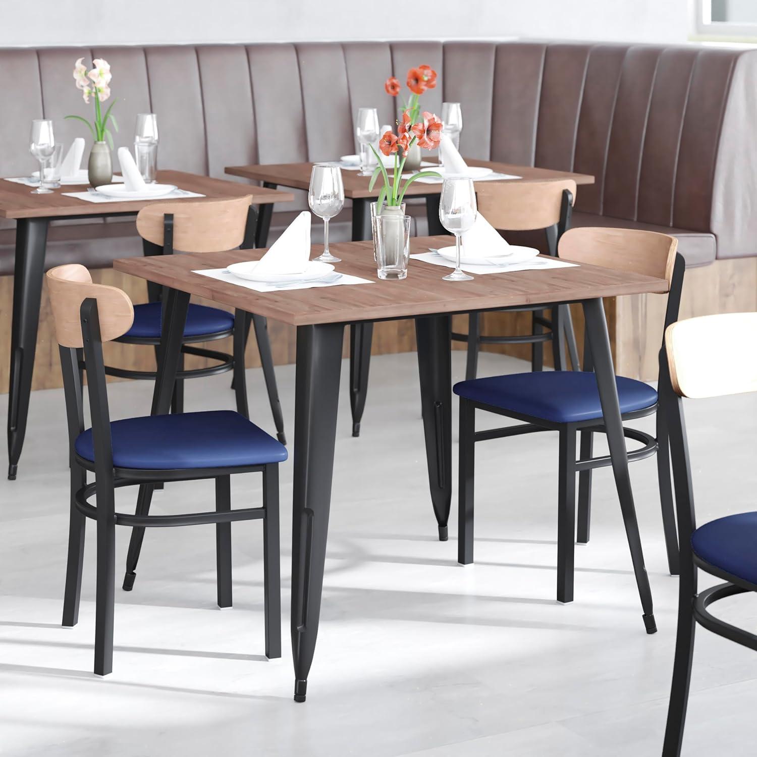 imageFlash Furniture Wright Commercial Grade Dining Chair Natural Birch Finish Solid Wood Seat and Boomerang Back 500 LB Capacity Black Steel FrameNatural Birch Wood BackBlue Vinyl Seat