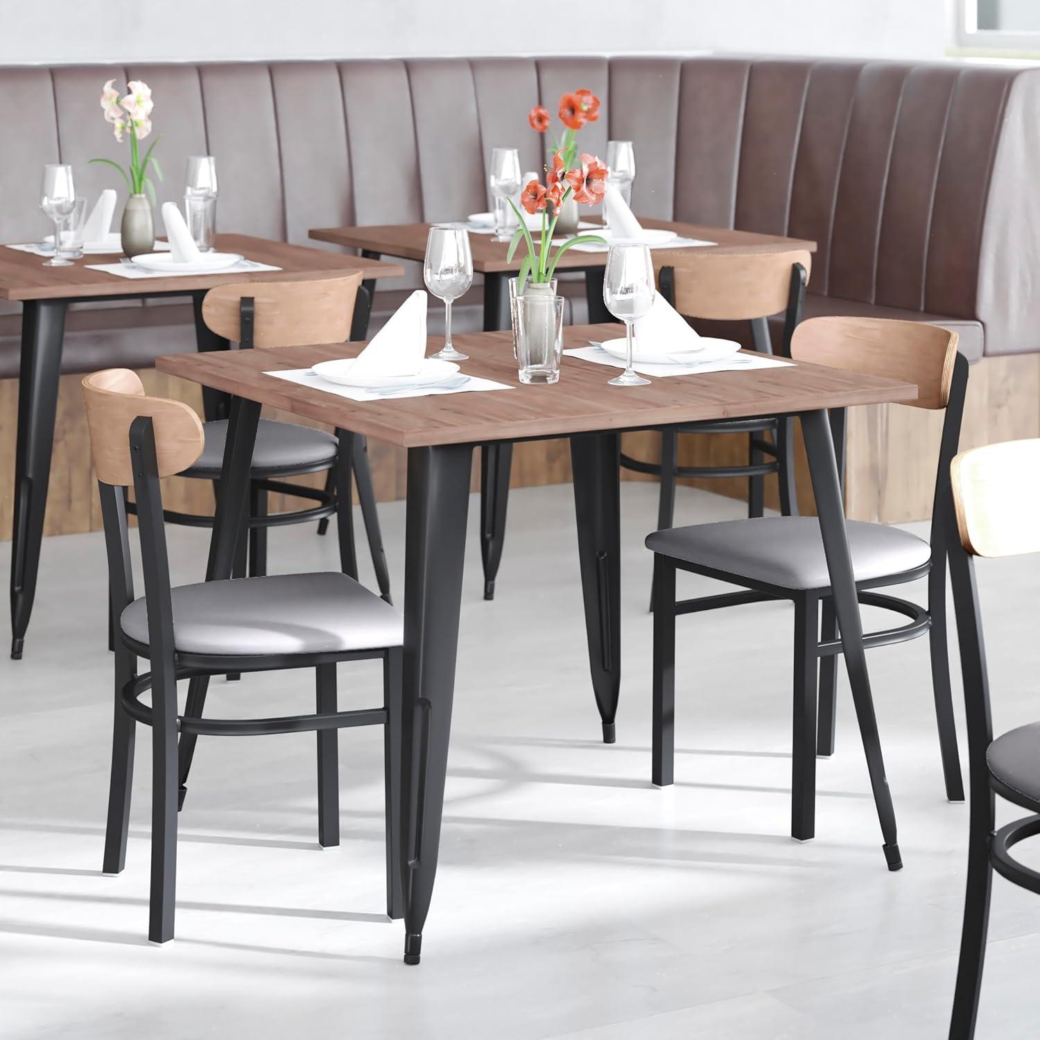 imageFlash Furniture Wright Commercial Grade Dining Chair Natural Birch Finish Solid Wood Seat and Boomerang Back 500 LB Capacity Black Steel FrameNatural Birch Wood BackGray Vinyl Seat