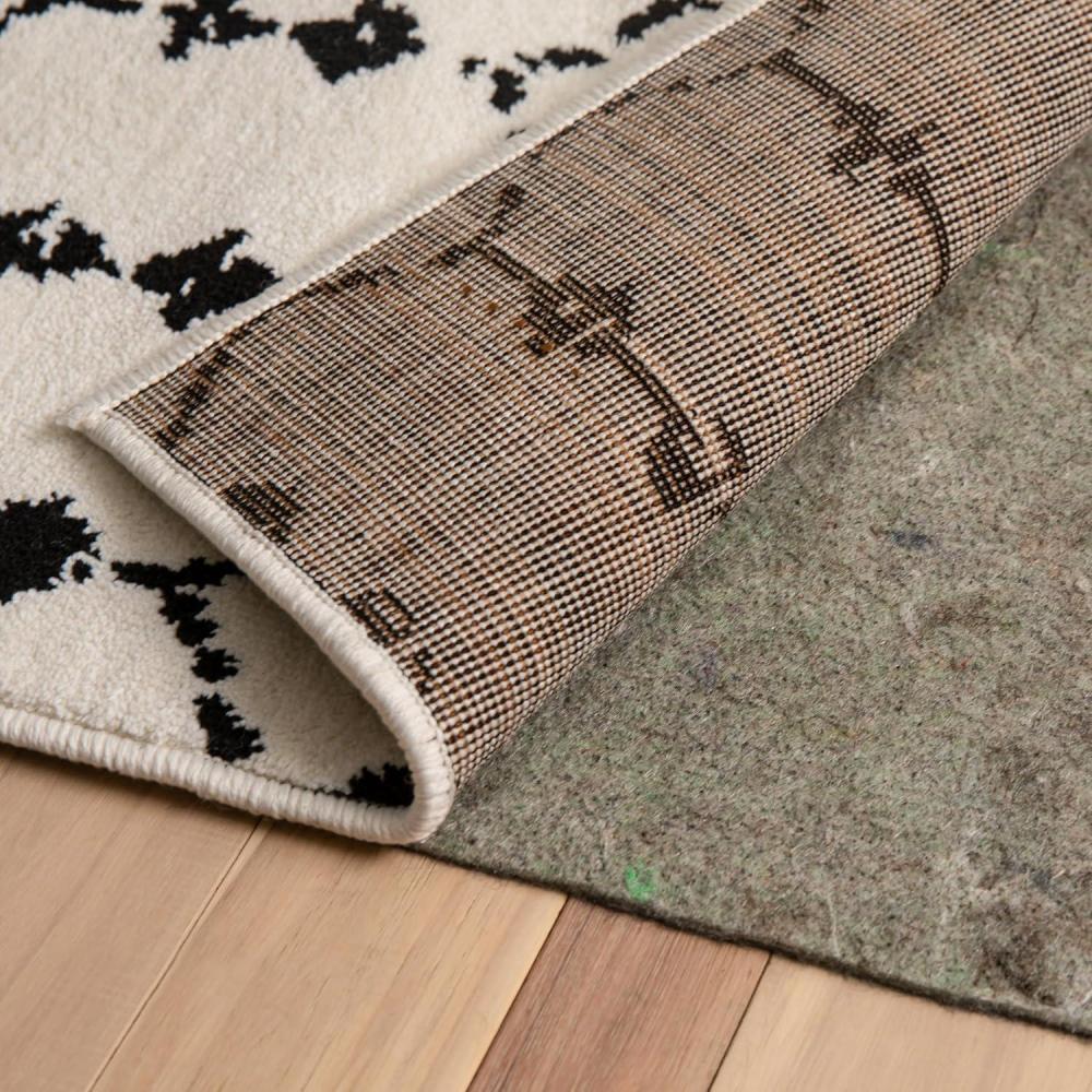 imageFlash Furniture Minnie SlideStop MultiSurface Reversible NonSlip Cushion Rug Pad 14quot Thick Floor Protection for 8x10 Area Rug Gray5 x 711 Rectangular