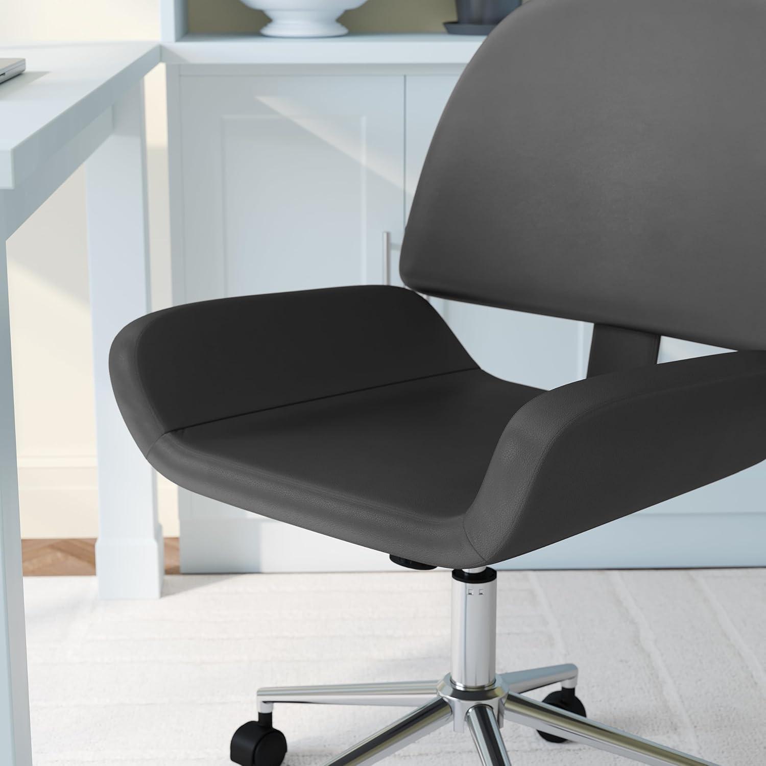 imageMartha Stewart Tyla Armless Swivel Task Chair for Home Office in White Faux Leather with Polished Brass FrameGray Faux LeatherPolished Nickel