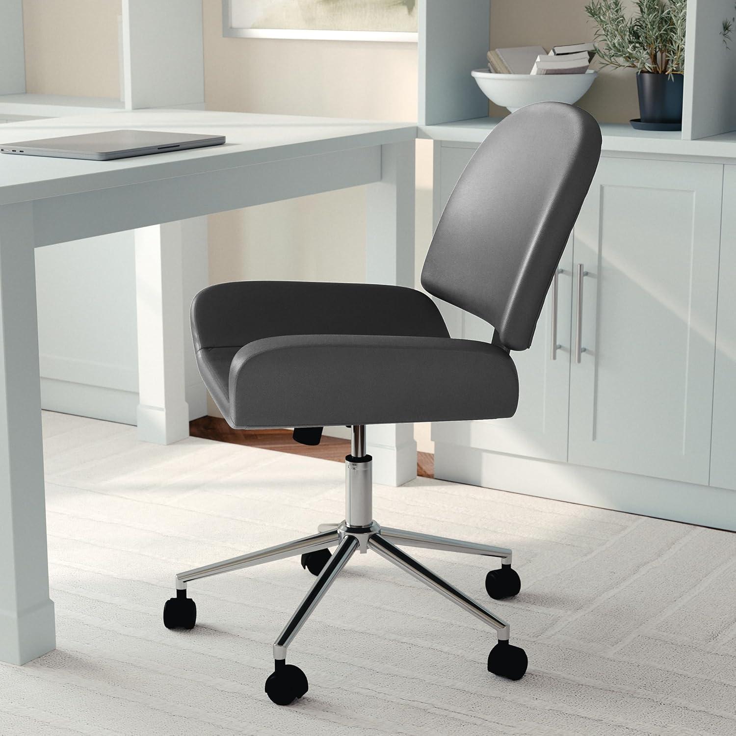 imageMartha Stewart Tyla Armless Swivel Task Chair for Home Office in White Faux Leather with Polished Brass FrameGray Faux LeatherPolished Nickel