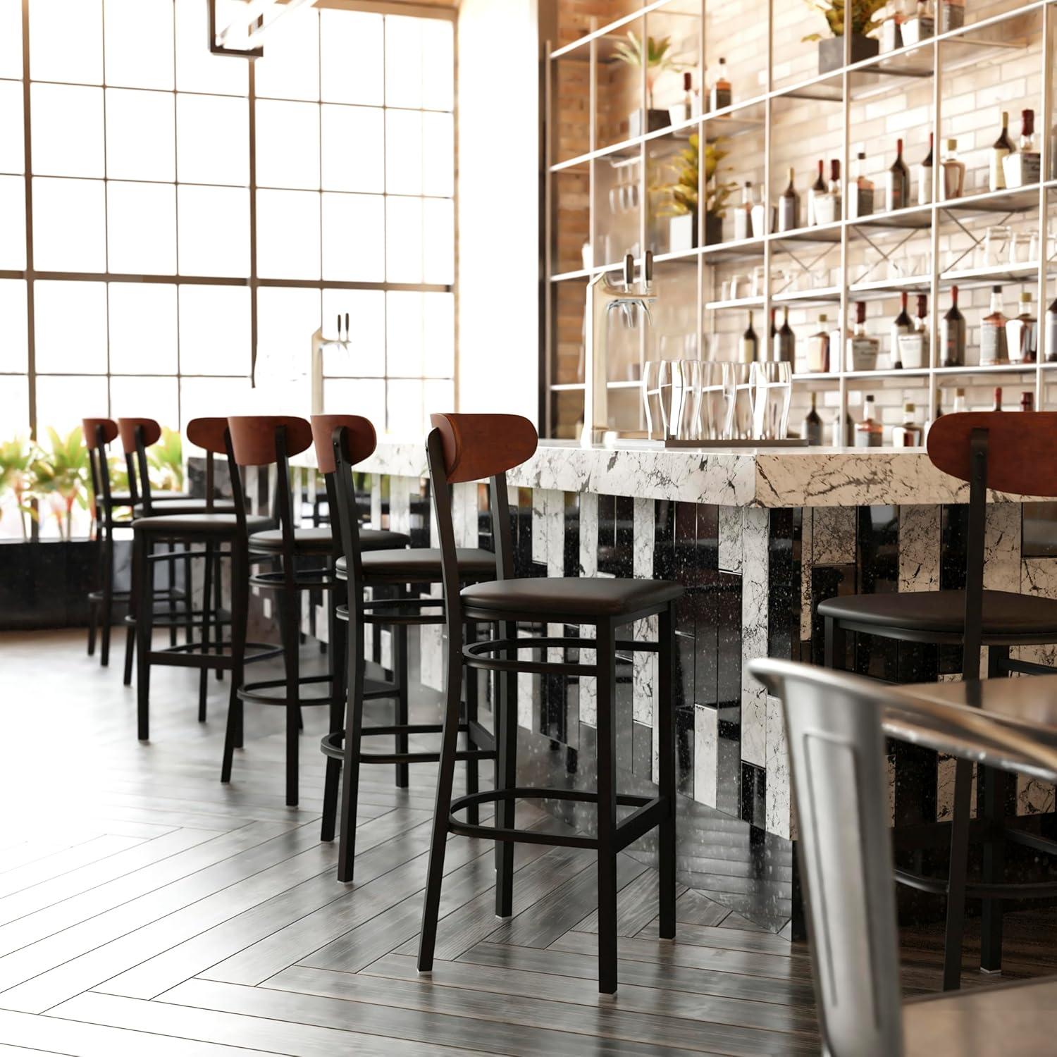 image:imageFlash Furniture Wright Set of 2 Commercial Barstools Walnut Wood Boomerang Back Black Vinyl Seat 500 LB Capacity Black Steel Frame Integrated FootrestWalnut Wood BackBlack Vinyl Seat