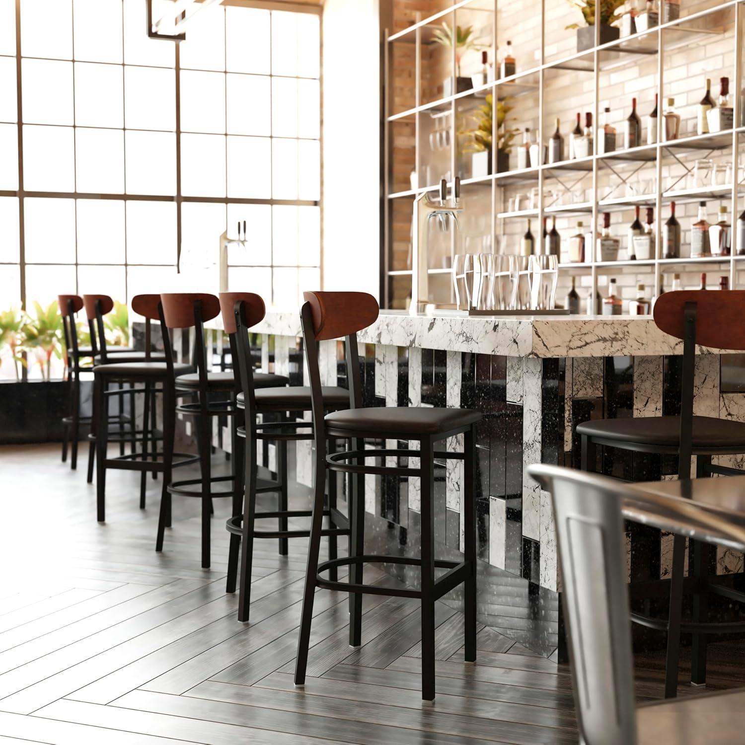 image:imageFlash Furniture Wright Set of 2 Commercial Barstools Walnut Wood Boomerang Back Black Vinyl Seat 500 LB Capacity Black Steel Frame Integrated FootrestWalnut Wood BackBlack Vinyl Seat