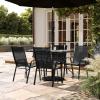 Flash Furniture Brazos Commercial Outdoor Dining Set, 47″ Tempered Glass Patio Table with Umbrella Hole, 4 Stack Chairs with Flex Comfort Seats and Backs, Navy/Black(Black)