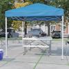 Flash Furniture Harris 10’x10′ White Pop Up Event Canopy Tent with Carry Bag and Folding Bench Set – Portable Tailgate, Camping, Event Set(Blue)